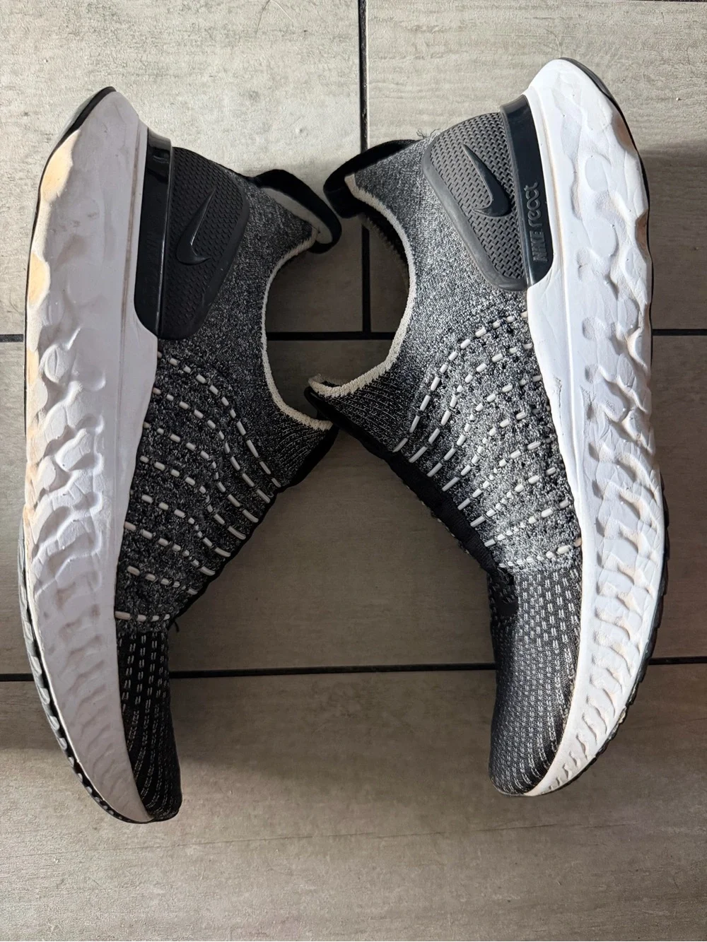 Nike Black and White Knit Slip-On Sneakers